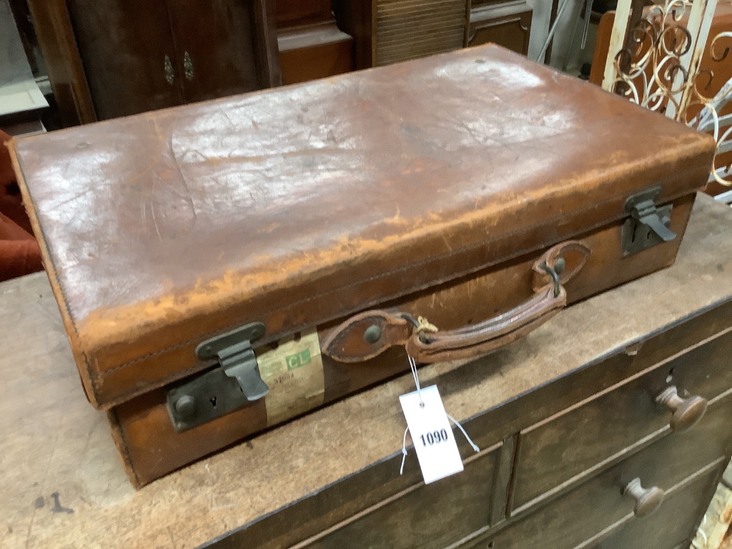 A leather case by John Pound & Co., width 60cm
